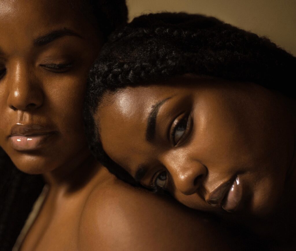 two black woman close to each other