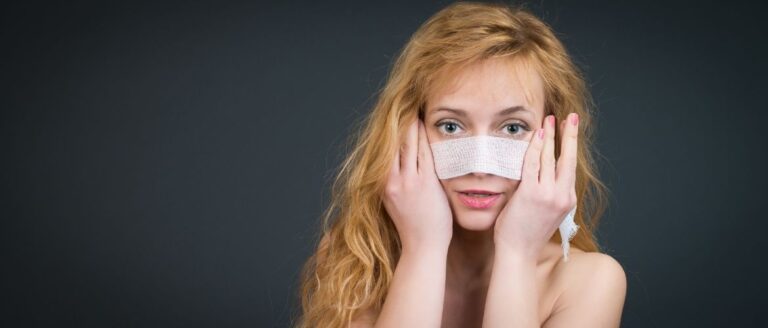 woman covering her nose using hydrocolloid bandage